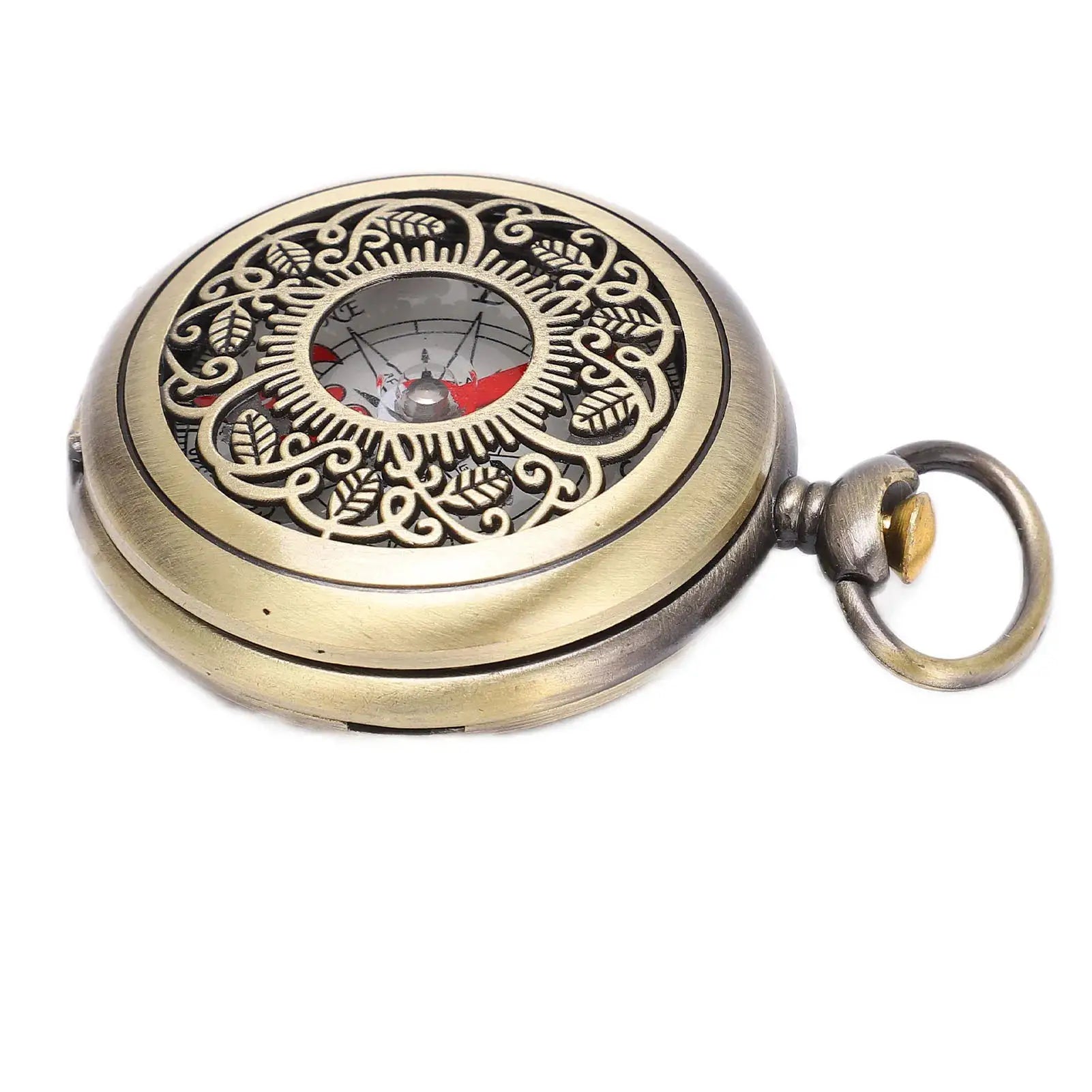 Brass gold pocket compass with ornate filigree, outdoor camping navigation tool.