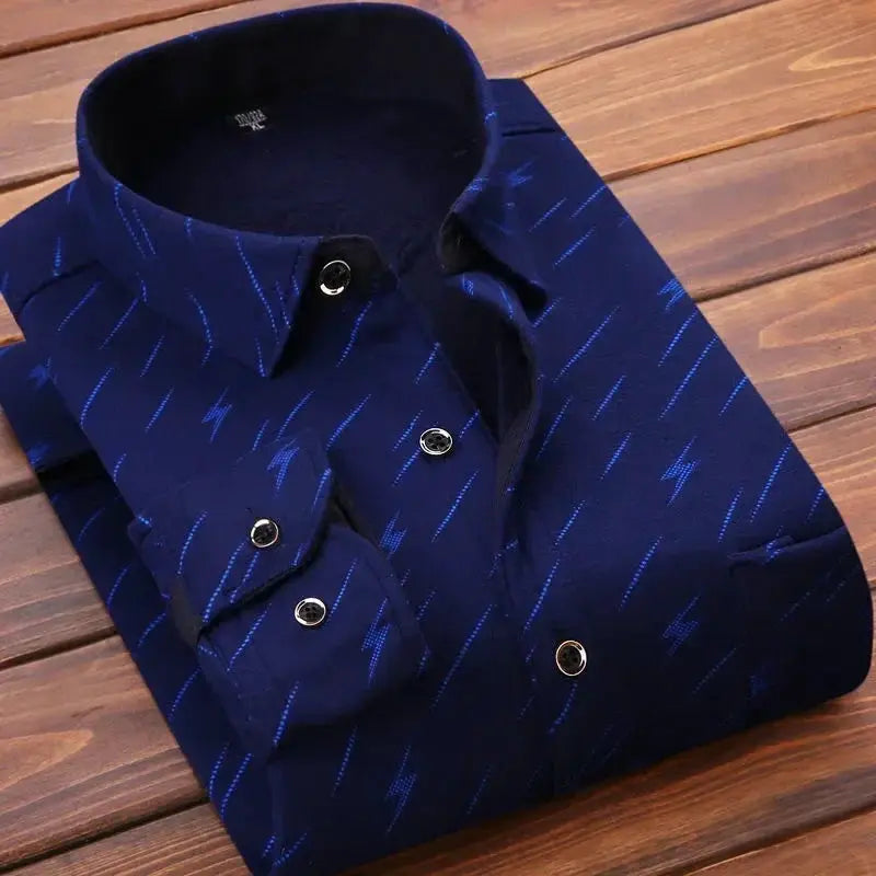 Men's navy blue plaid flannel shirt with long sleeves and button-down front, folded on a wooden surface