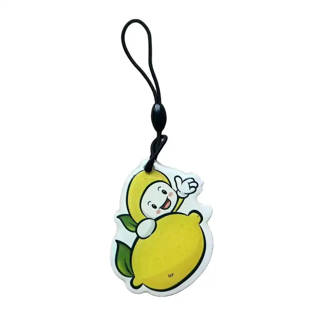Simples Market lemon-shaped RFID key tag with cartoon lemon charm, yellow waterproof keyfob and black strap
