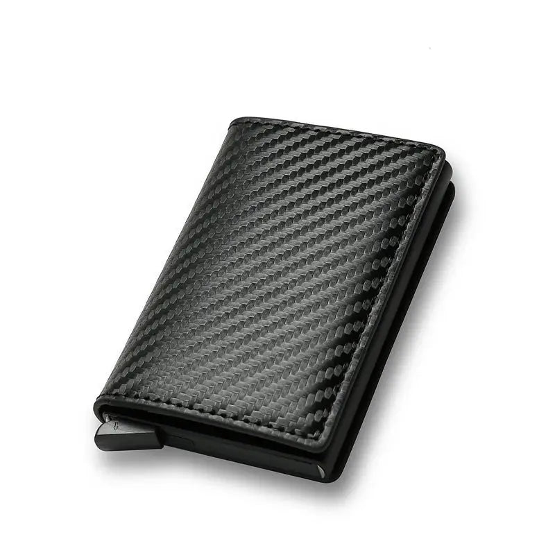 Anti RFID carbon fiber card holder wallet in black by Simples Market with minimalist pop-up card slot