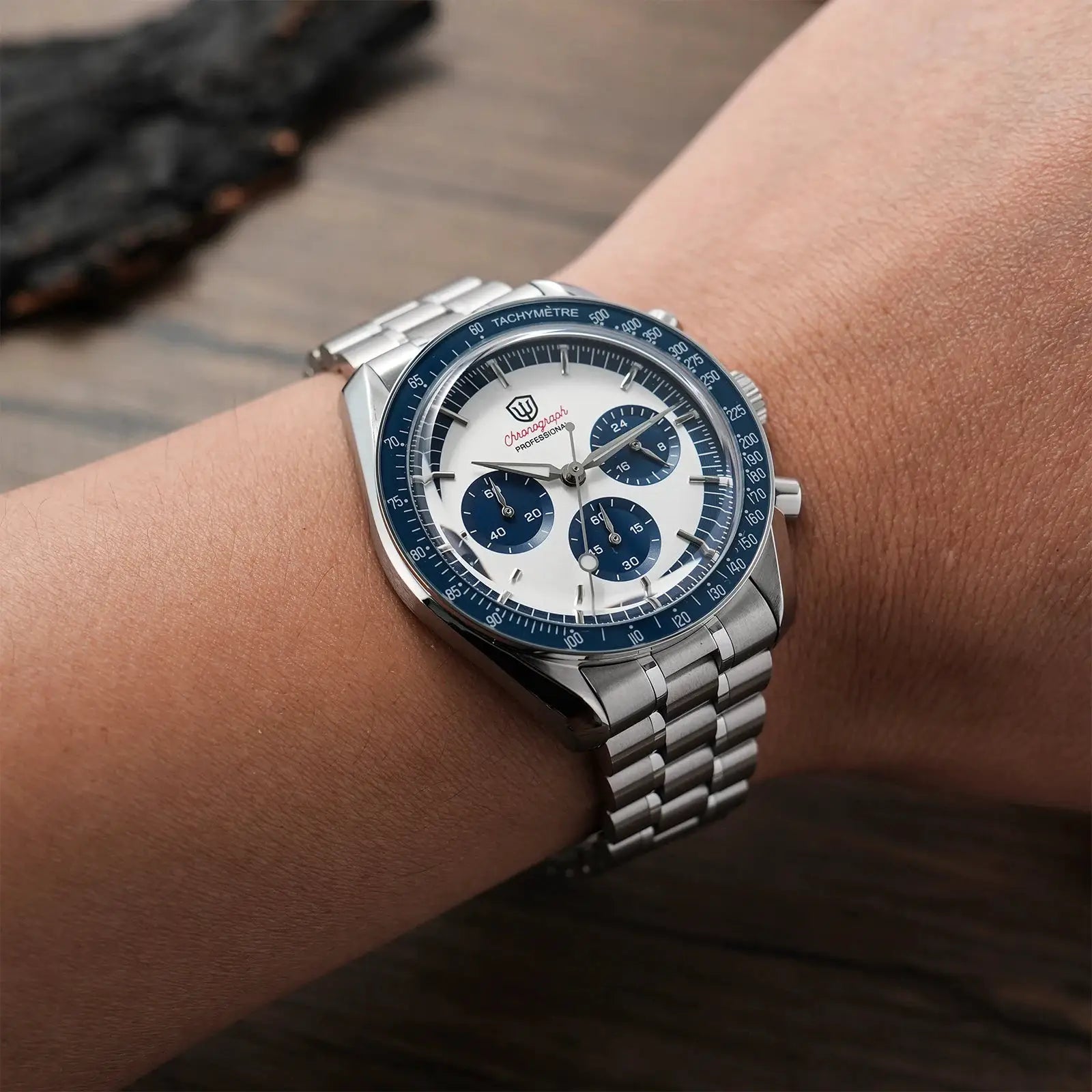 Watchdives WD1863 39mm stainless steel chronograph wristwatch with blue tachymeter bezel, white dial and blue subdials