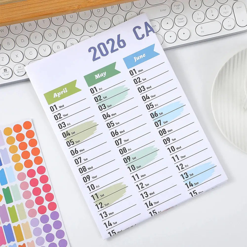Colorful paper wall calendar 2026 with stickers, monthly banners and a 365-day planner.