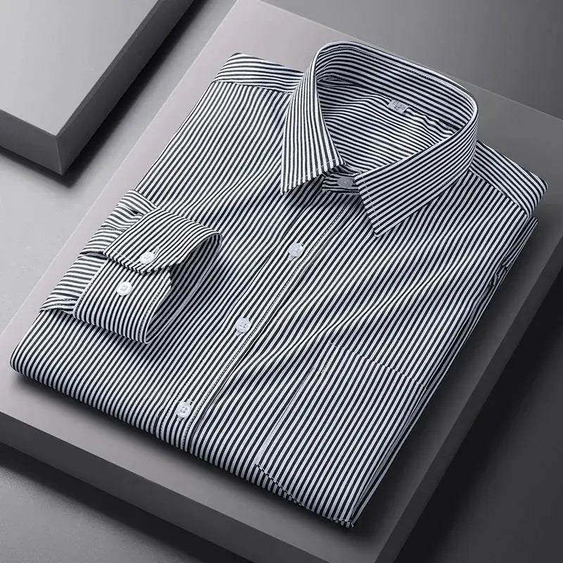 Men's long-sleeve striped dress shirt in blue and white, folded with button cuffs.