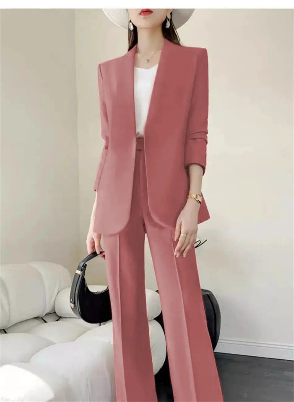 Pink women's 2-piece blazer suit with matching wide-leg pants by Simples Market