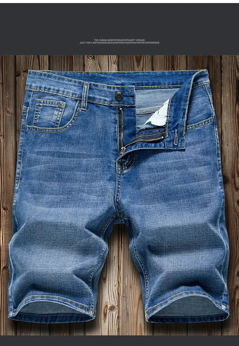 Men's slim-fit blue denim shorts with zip fly and front pockets.