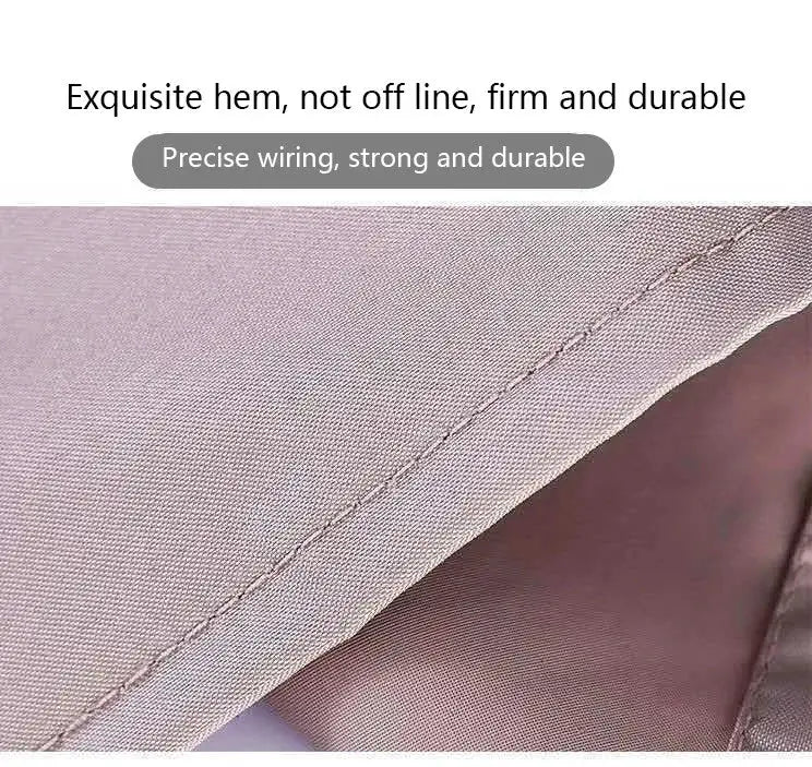 Hand-wiping apron in beige close-up showing reinforced hem and stitching