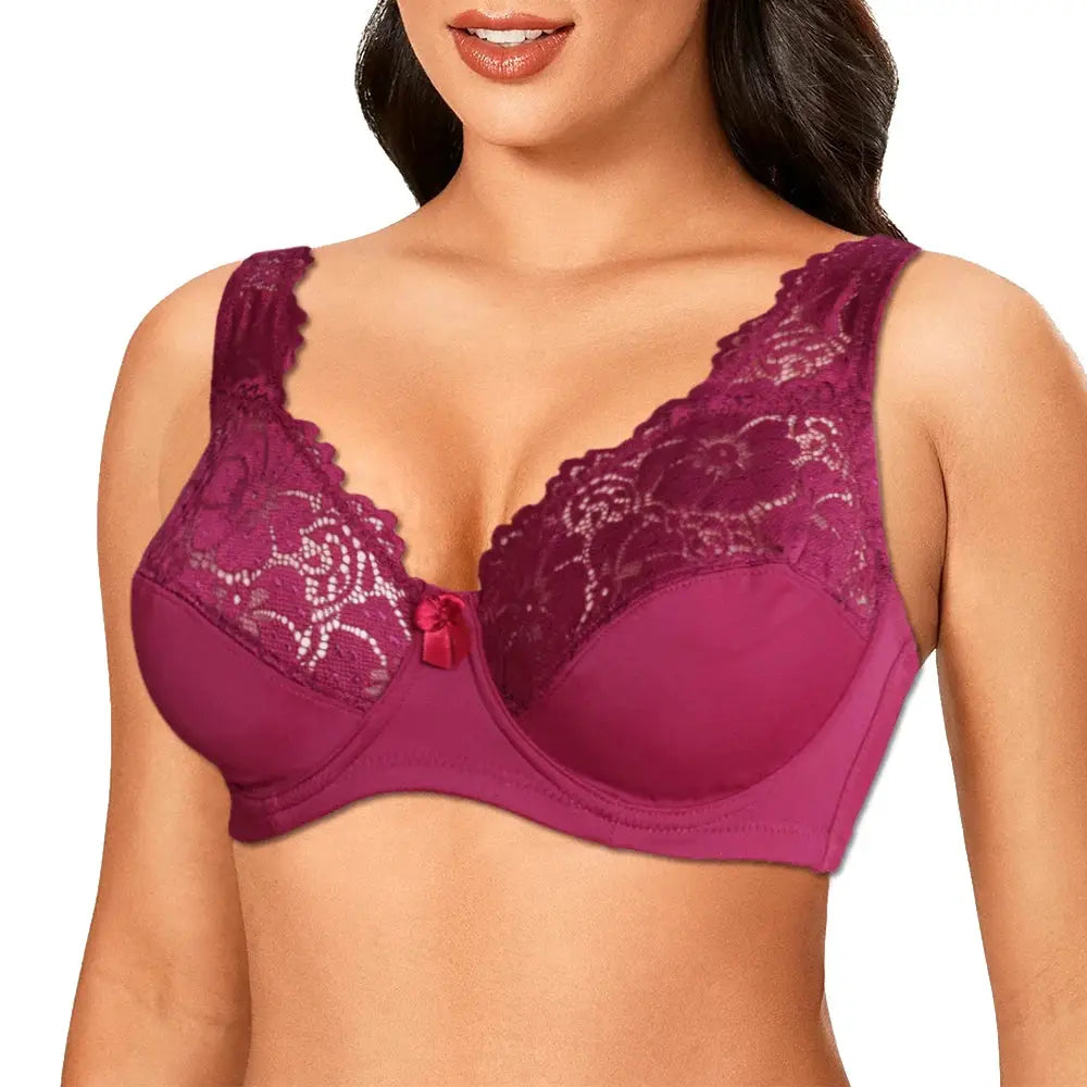 Bra with magenta lace underwire and floral lace cups, front bow detail.