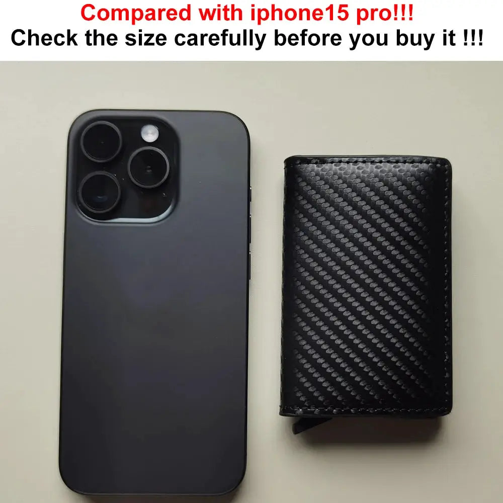Simples Market anti-theft RFID card holder wallet; black minimalist slim wallet beside a smartphone