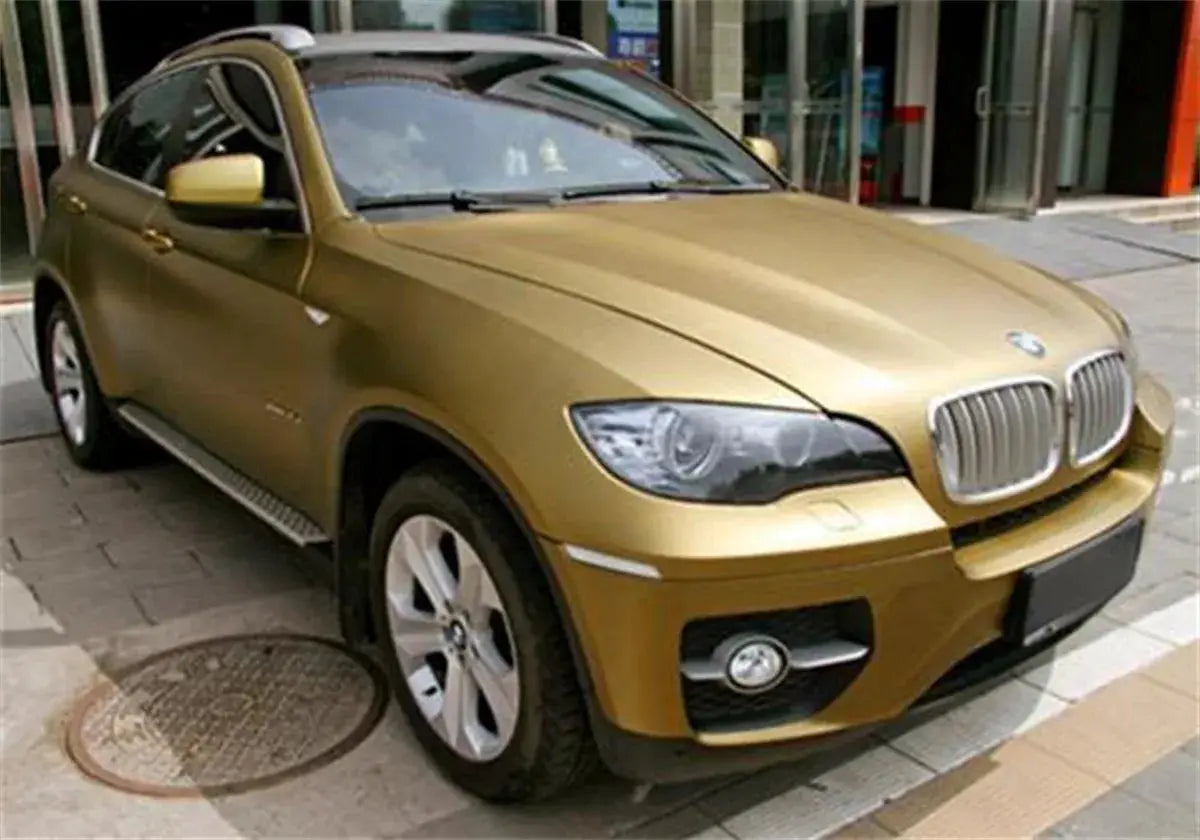 Matte gold wrap vinyl film for cars with air release channels, BMW SUV shown