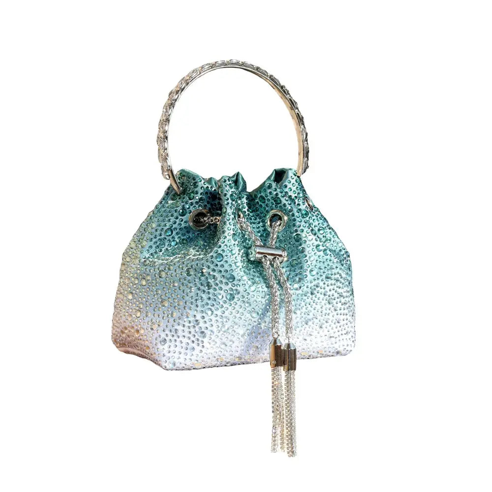 Rhinestone evening clutch bag with crystal hoop handle; turquoise gradient bejeweled purse.