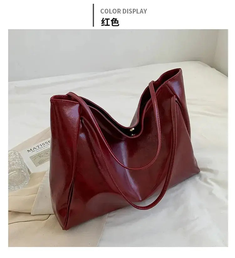 Simples Market red PU leather tote bag with shoulder strap, large-capacity retro bucket style.