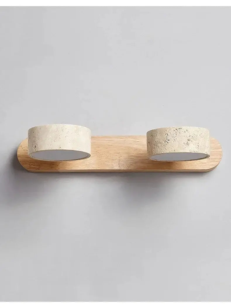 Dual round LED wall light with concrete-textured lamps on a wooden backplate