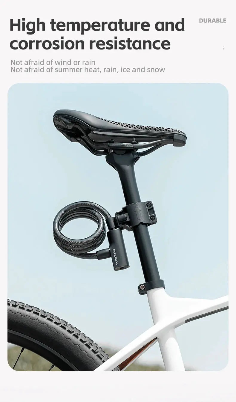 black ROCKBROS bicycle lock with keys and steel cable, mounted on bike seat post