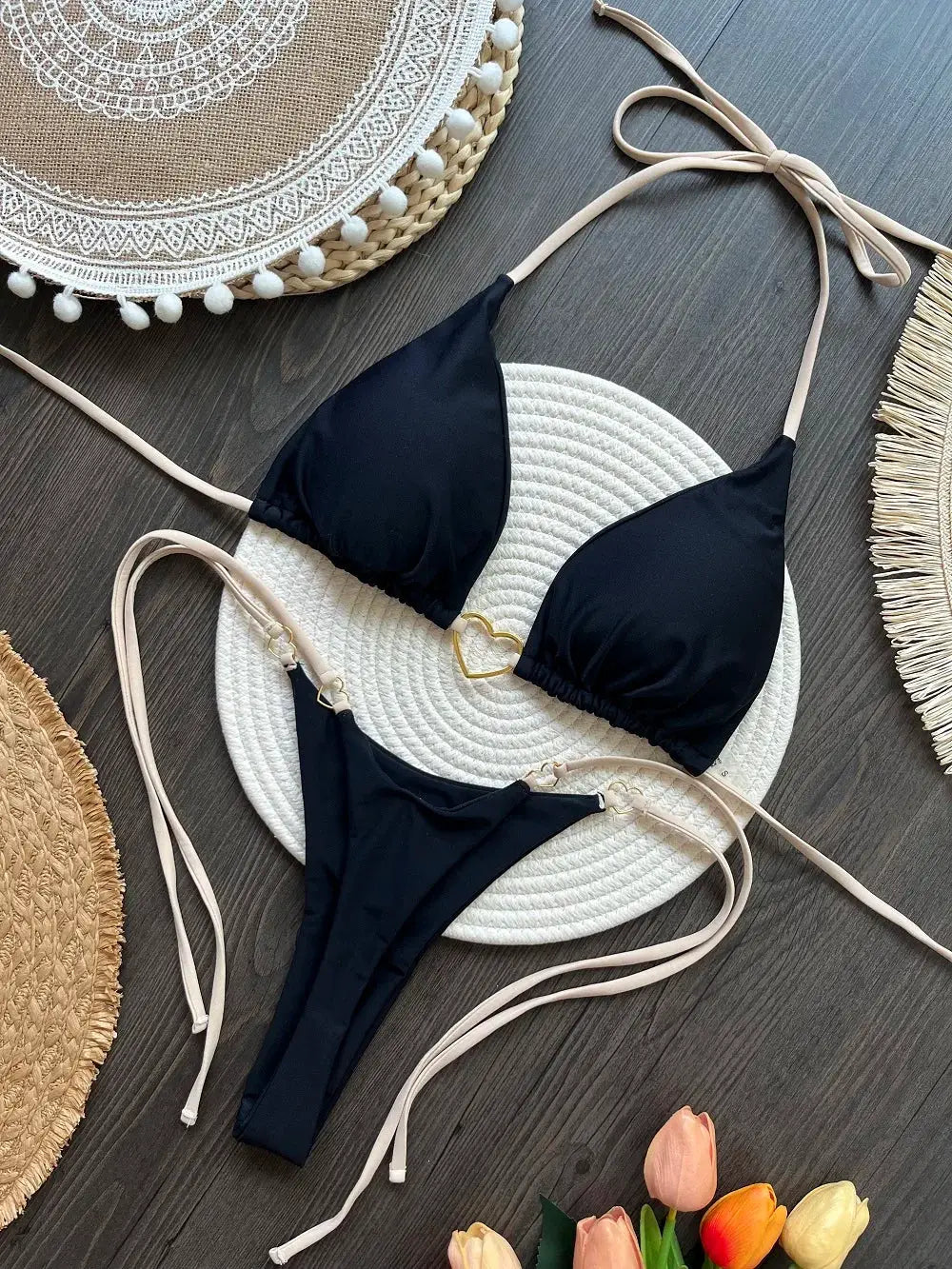 RUOTONSEPT black two-piece bikini with halter triangle top, thong bottom, beige straps and gold heart detail