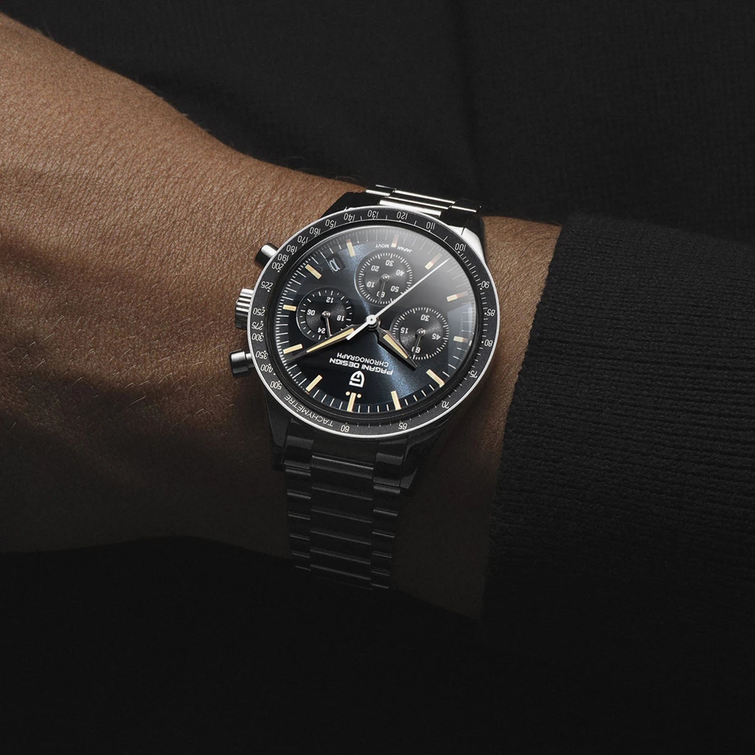 Pagani Design CK2998 tribute chronograph watch on wrist, stainless steel bracelet, black dial