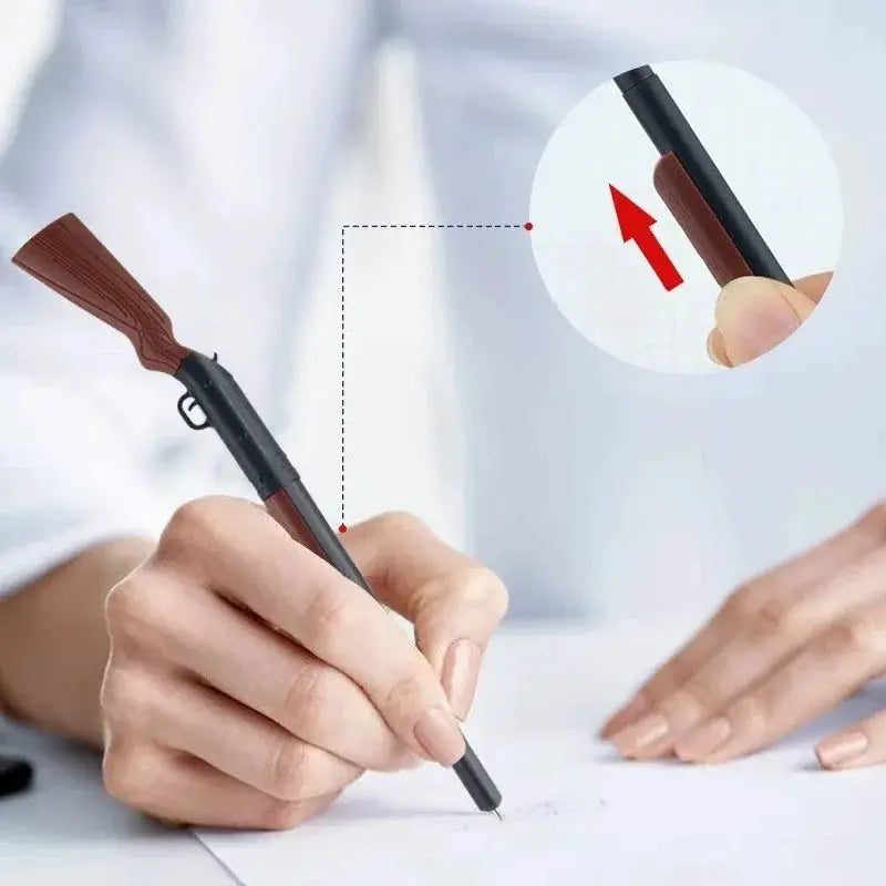 Unique Design Smooth Writing Gun Pen by Simples Market; black body, brown grip, smooth writing tip.
