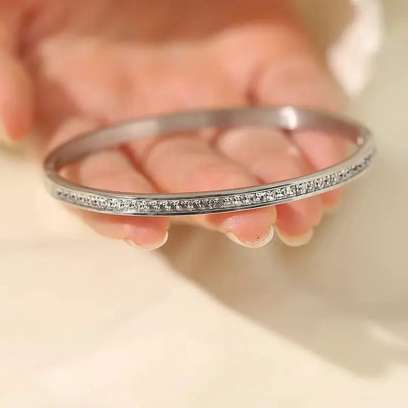 Openable stainless steel cuff bracelet for women, silver-tone with crystal-accent edge