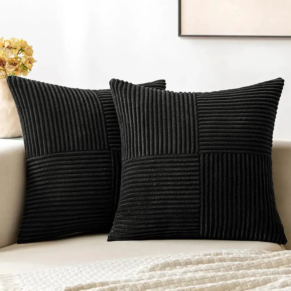 Throw pillow covers: two black corduroy patchwork, 18x18 inches.