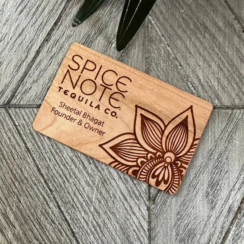 Wooden NFC laser card with Spice Note Tequila Co. logo and floral engraving