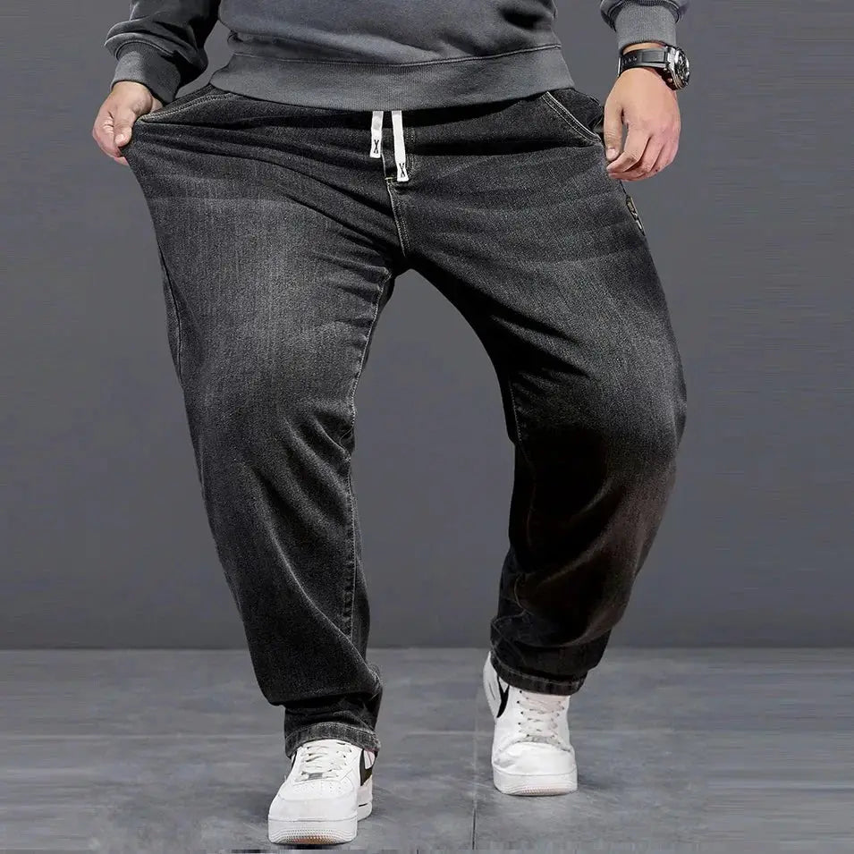 Plus-size men's baggy denim jeans with elastic waistband, black wash