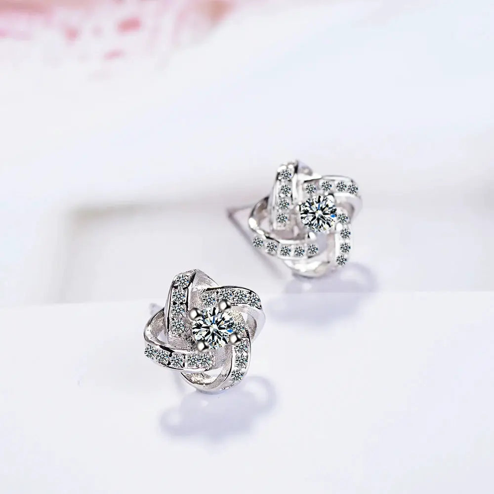 Sterling silver zirconia twist earrings for women, pair by Simples Market