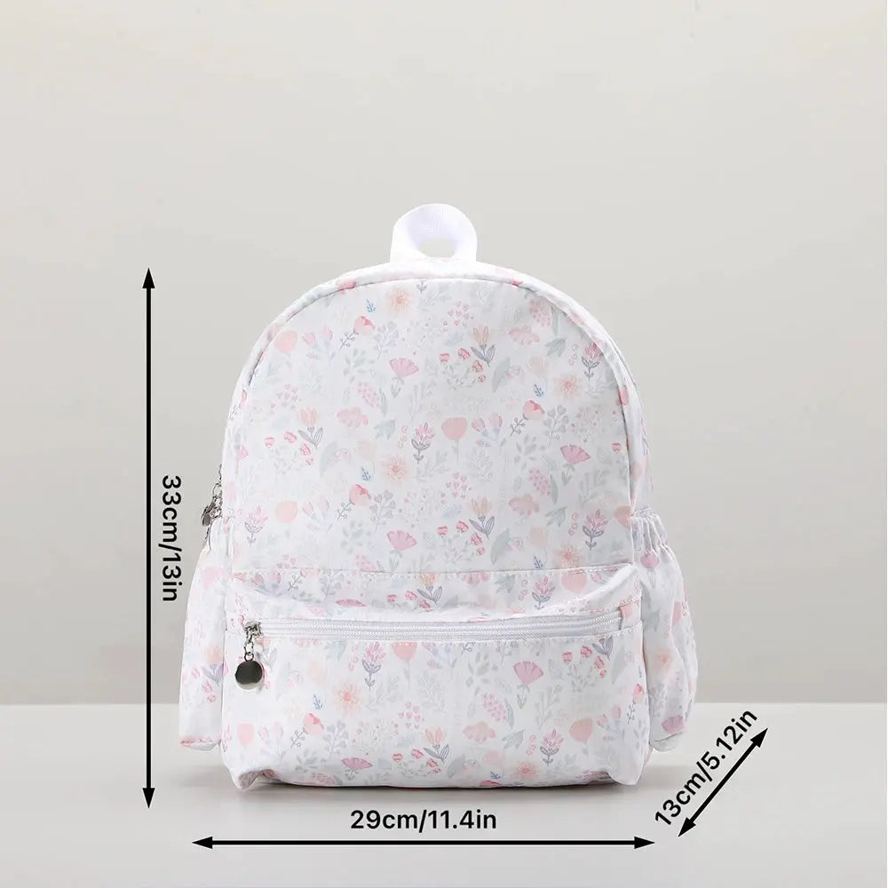 Toddler backpack by Simples Market with pastel floral print on white, lightweight kindergarten bag, 29x13x33 cm
