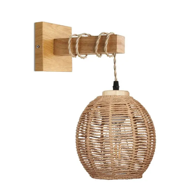 Bamboo lantern wall lamp with natural woven rattan shade, E27 bulb, mounted on a wooden wall bracket
