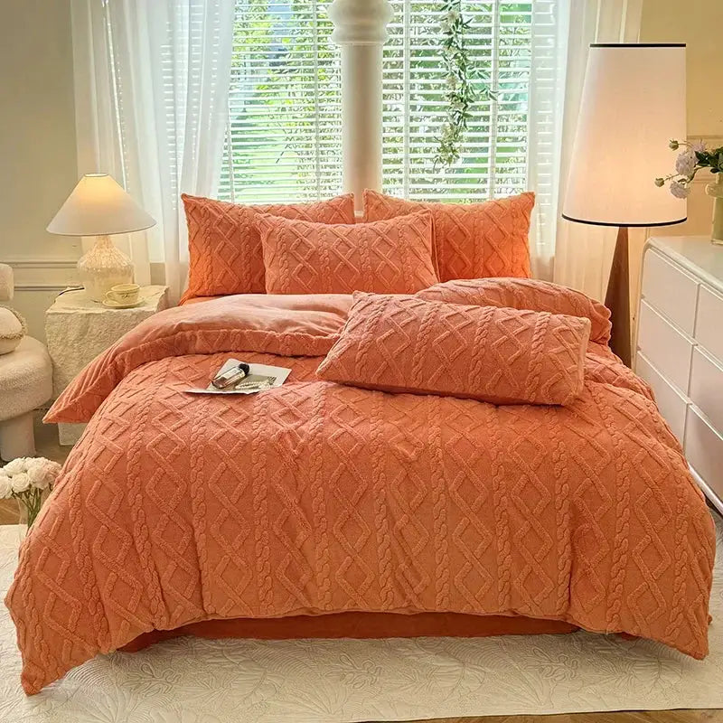 Simples Market Tafuru Milk fleece quilt set in coral peach solid color with matching pillow shams on bed
