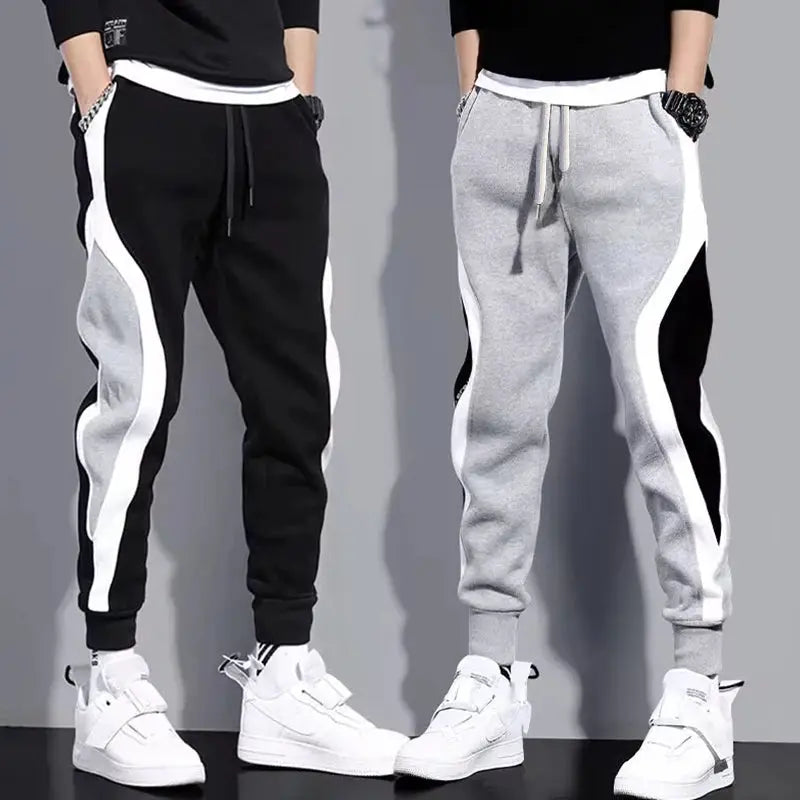 Men's patchwork jogger pants by Simples Market, two pairs in black/gray with white side panels, drawstring waist