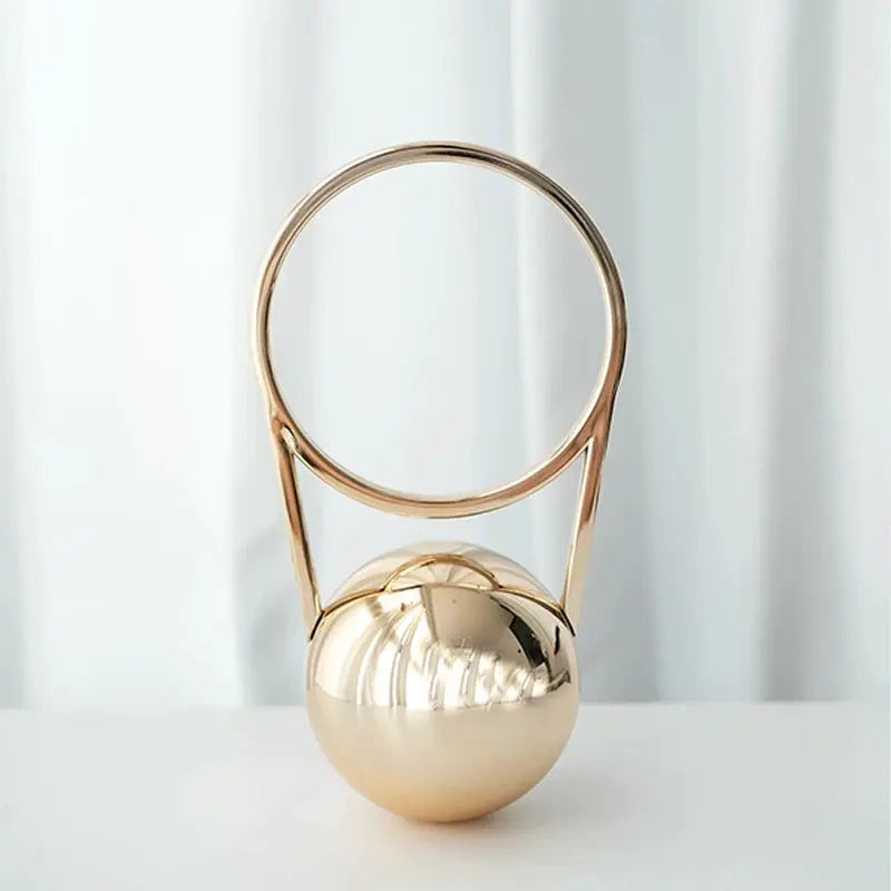 Luxury designer evening clutch with ball-handle ring, gold-tone metal by Simples Market