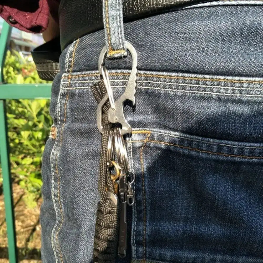 Bottle Opener Multifunctional Carabiner keychain in stainless steel by Simples Market, with hex driver.