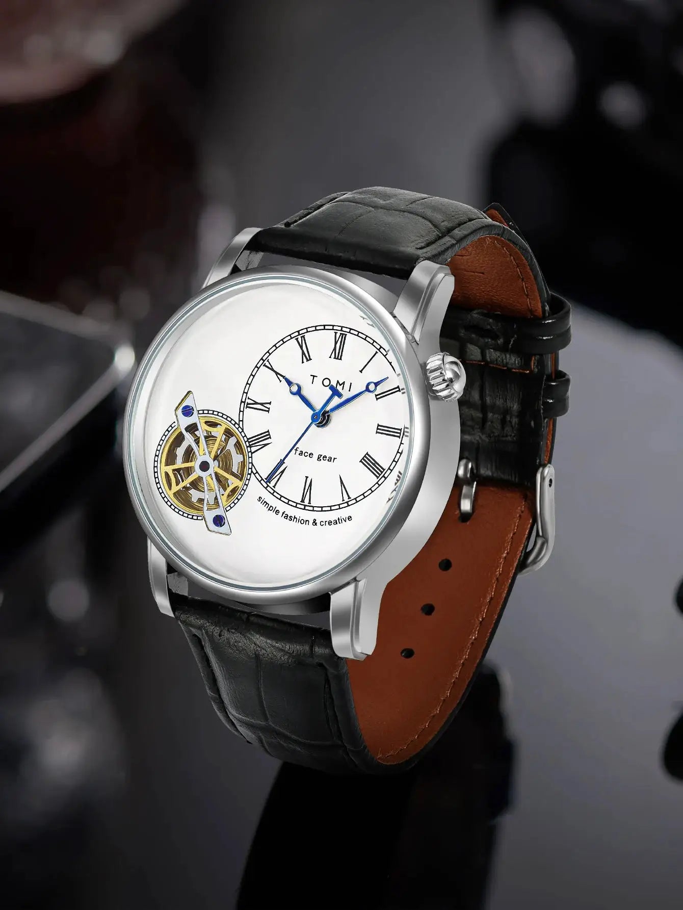 TOMI men's quartz watch by Simples Market with silver case, skeleton dial, blue hands, double-tone leather strap