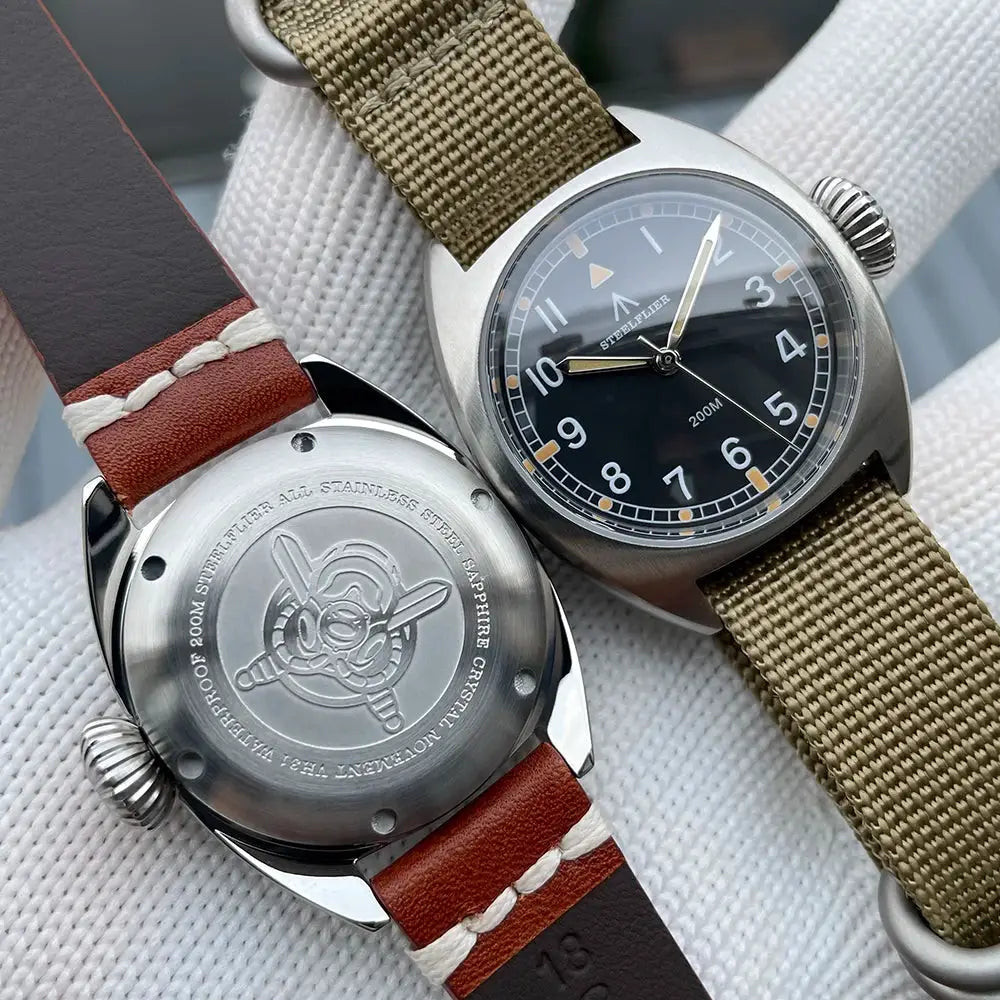 STEELFLIER SF745 quartz wristwatches, 36mm stainless cases, black dials, luminous hands, khaki nylon and brown straps