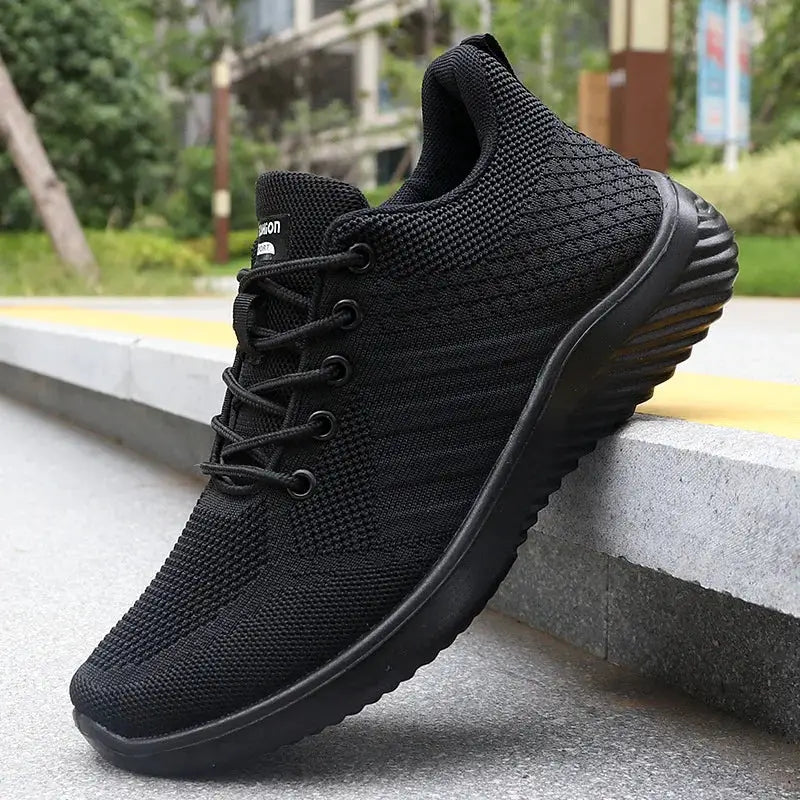 Men's casual sneakers by Simples Market, black knitted breathable lightweight running shoes.