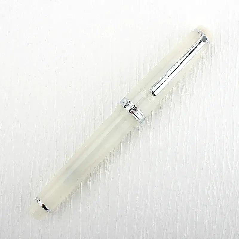 Jinhao 82 fountain pen in ivory acrylic with silver clip and cap band