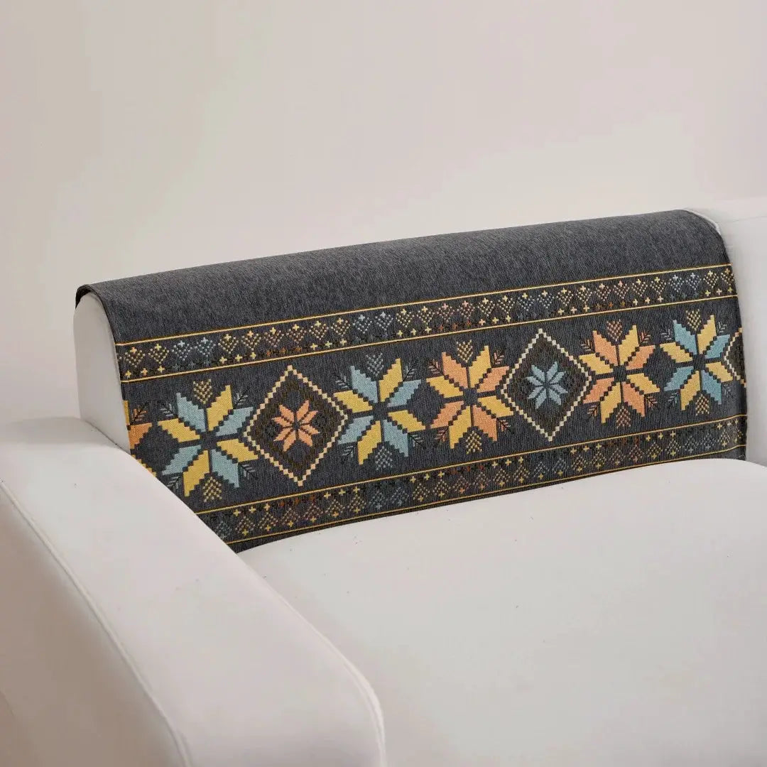 Bohemian jacquard chenille sofa towel; dark gray with multicolor geometric motif for sofa protection.