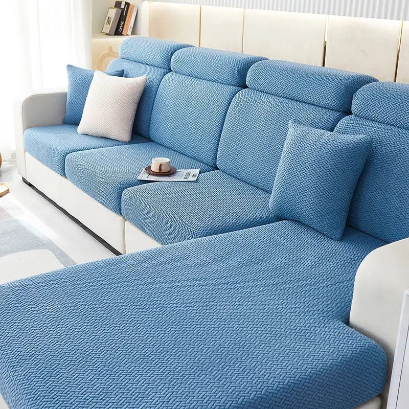 Blue jacquard sofa slipcover set with cushions for an L-shaped sofa; stretch-fit