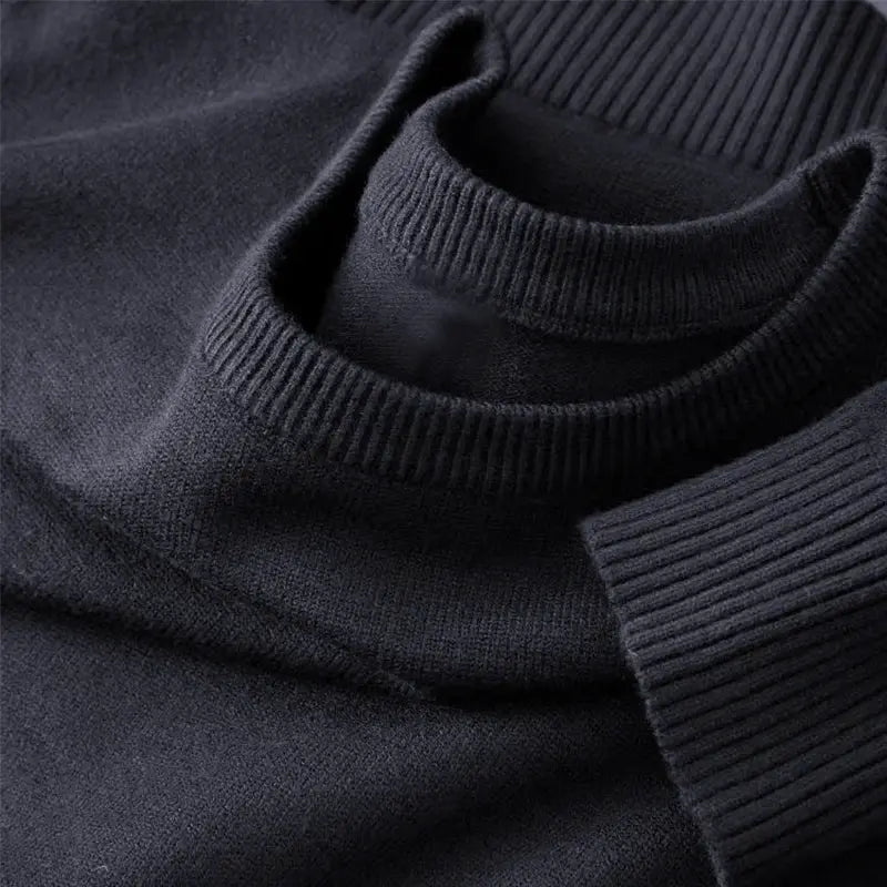 Men's black crewneck knit pullover sweater with ribbed cuffs and collar, lightweight and soft