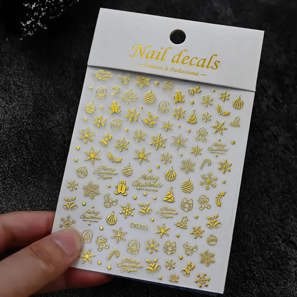 Winter Christmas nail decals sheet by Simples Market in gold with snowmen, snowflakes, ornaments