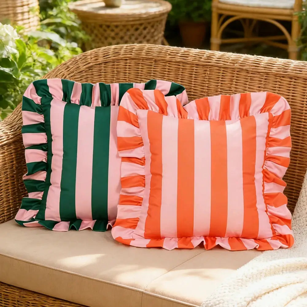 Two velvet striped pillowcases, 18x18 inches, in green/pink and orange/pink with ruffled edges