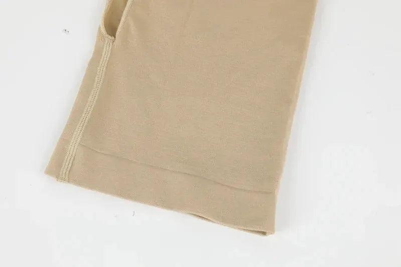 Simples Market men's beige full-body shapewear bodysuit fabric close-up with compression seams