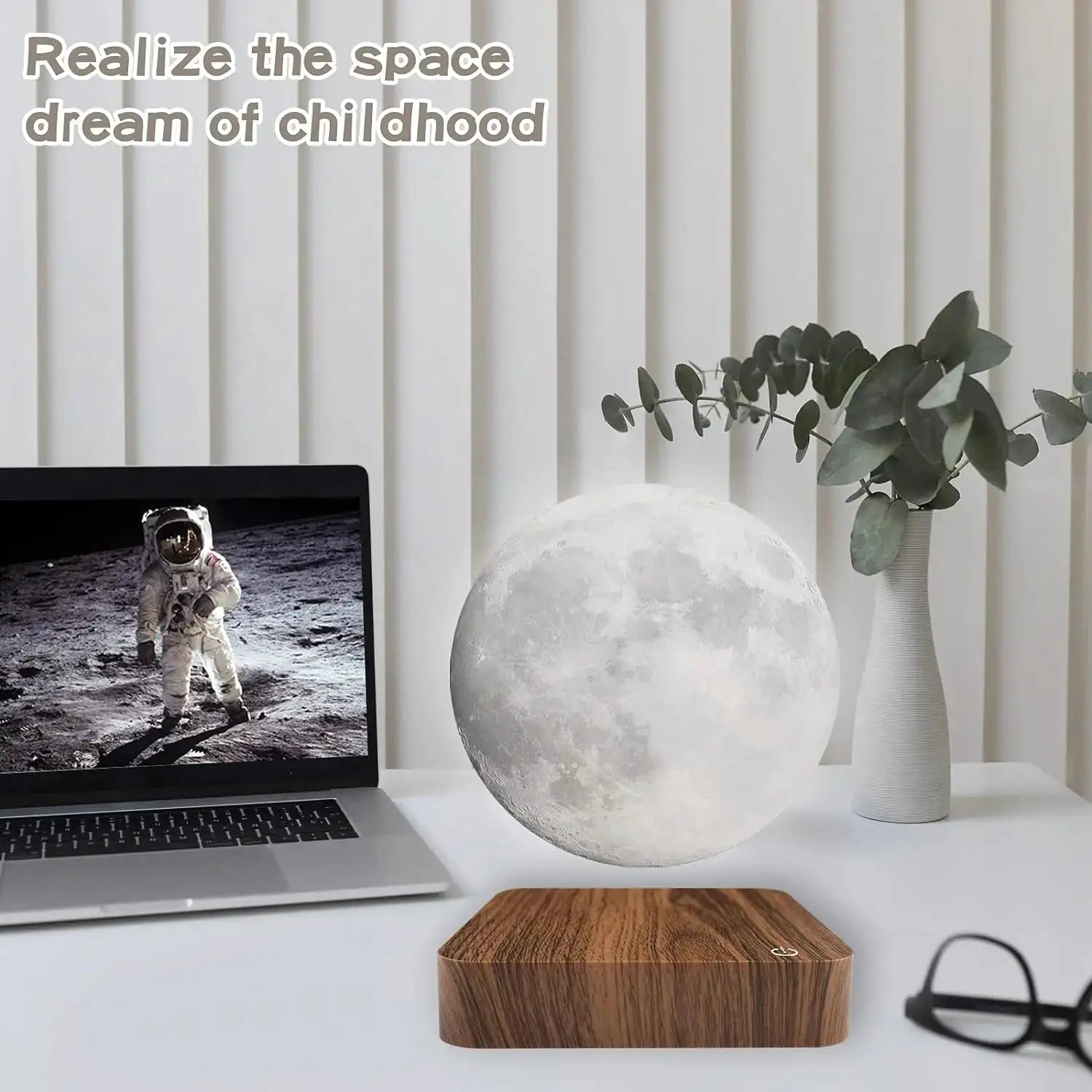 Floating moon lamp with wooden base by Simples Market; 3-color LED night light on a desk beside a laptop
