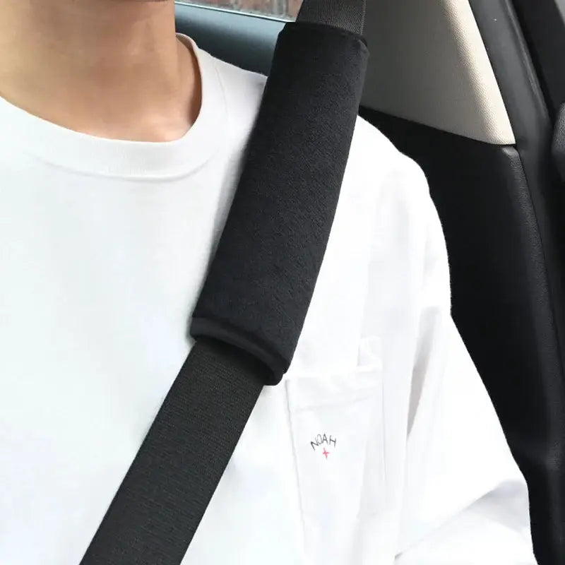 2pcs black seat belt shoulder pads for car interior by Simples Market.