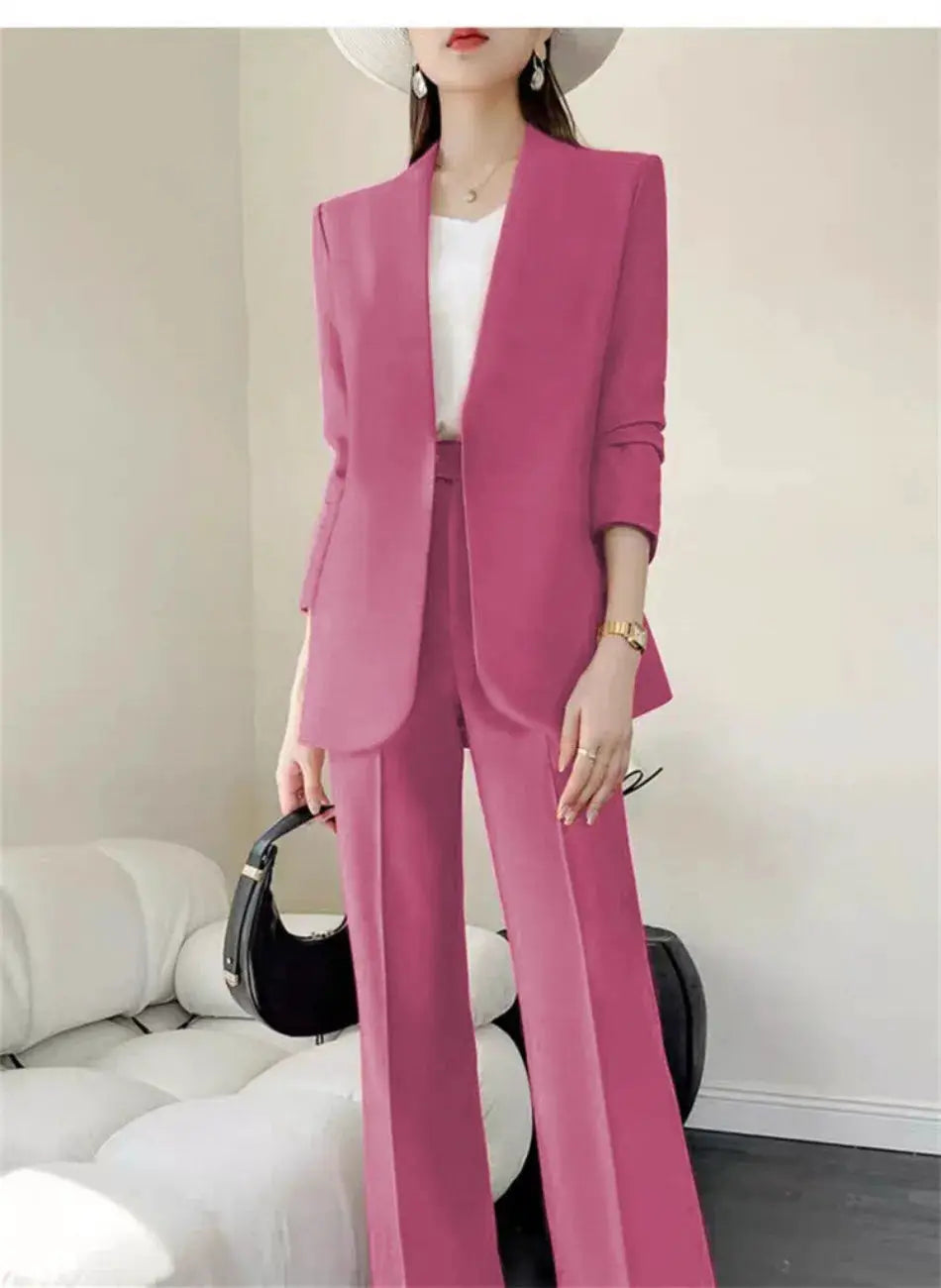 Pink 2-piece women's suit set with tailored blazer and wide-leg pants.