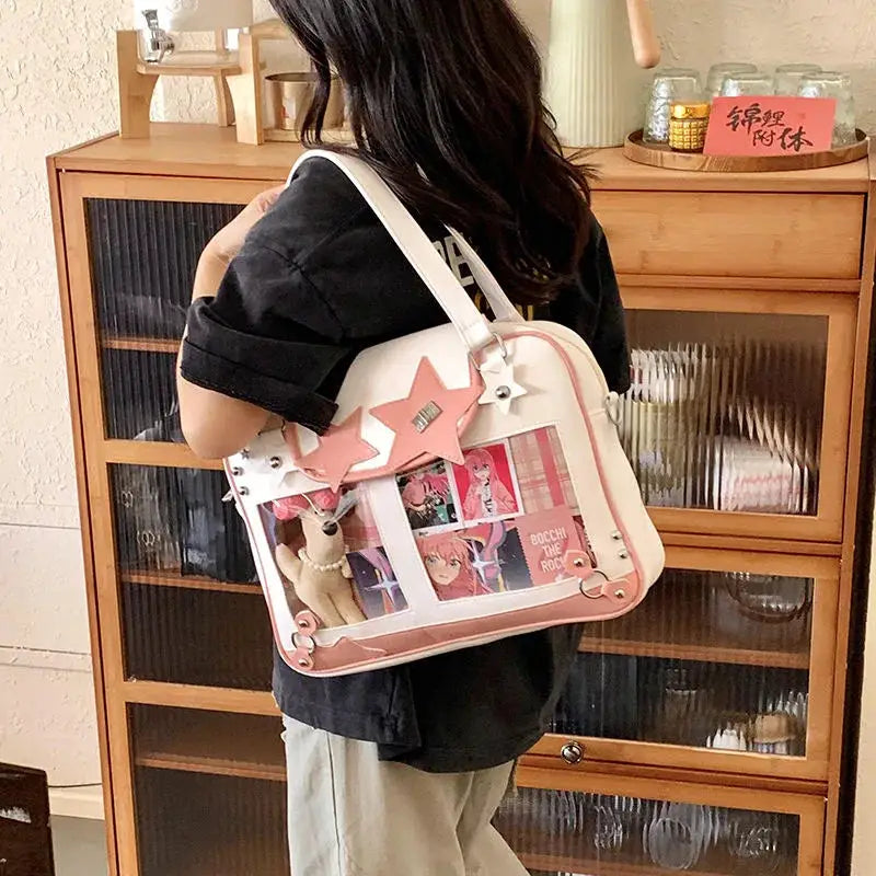Simples Market Y2K star ita bag crossbody with pink transparent pocket panels featuring anime collage and star patches.