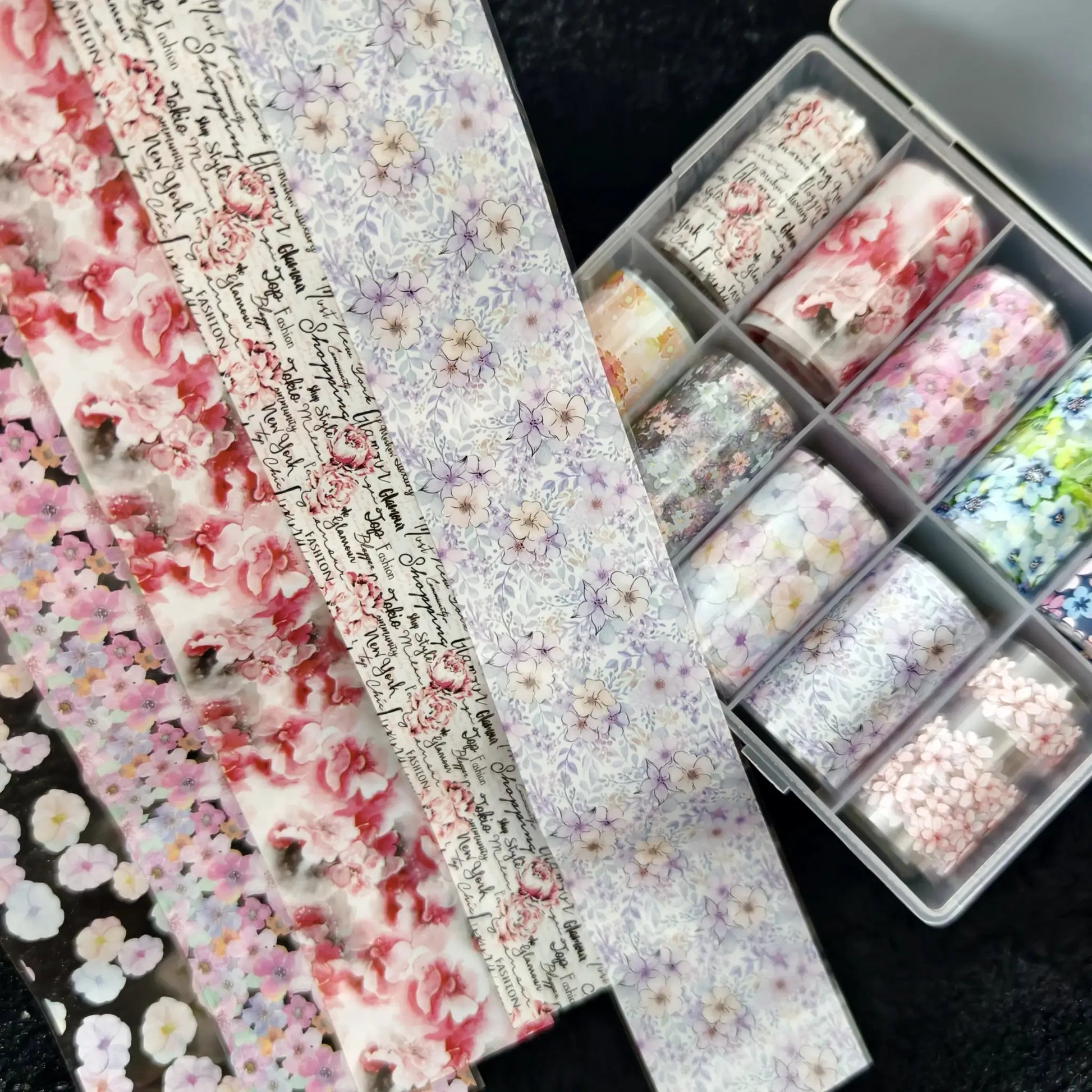 Nail foils set by Simples Market, 10 rolls of floral bow patterns in pink, lavender, and white