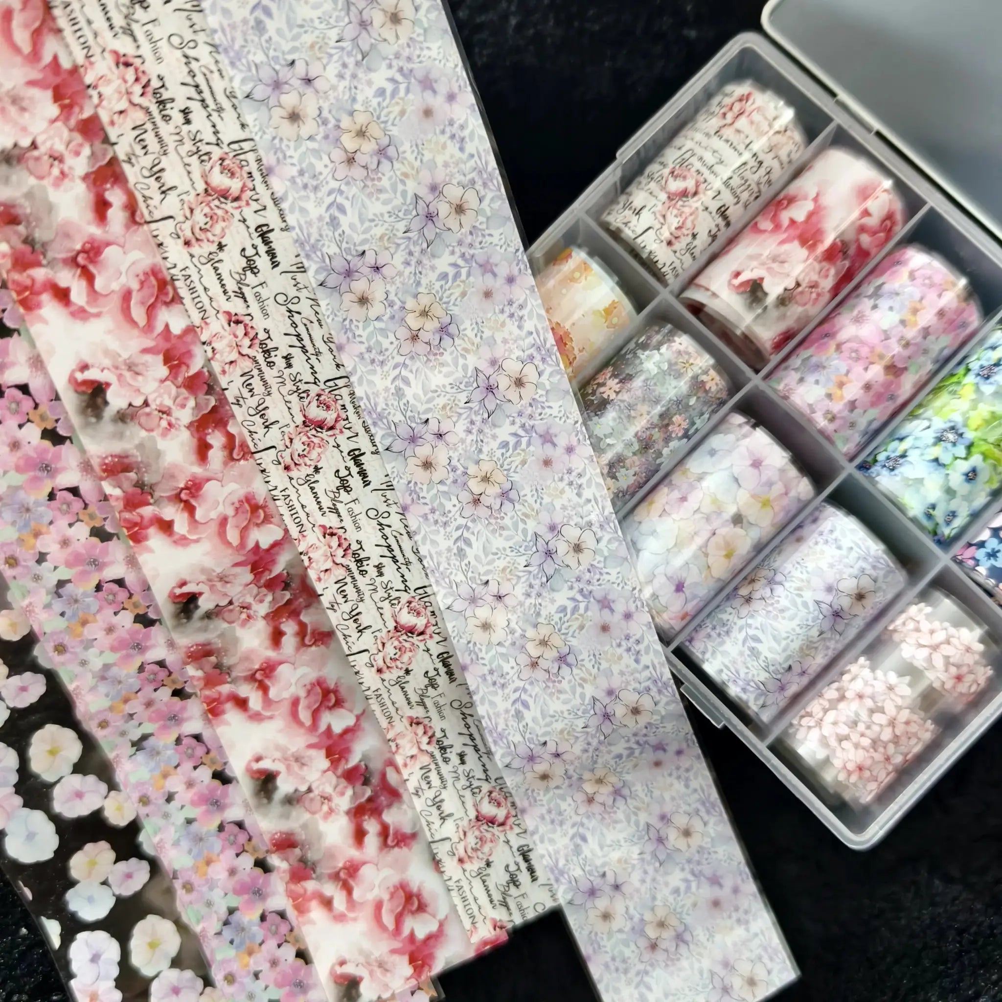 Nail foils set by Simples Market, 10 rolls of floral bow patterns in pink, lavender, and white