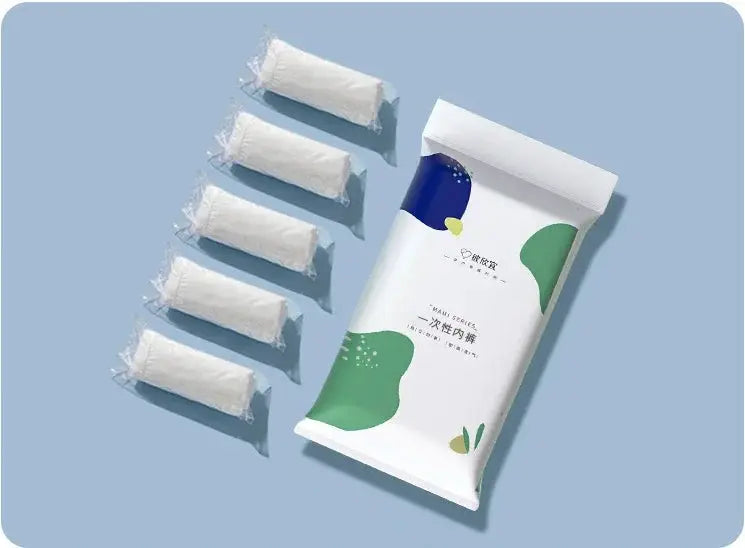 Disposable maternity panties by Simples Market, six white, individually wrapped postpartum shorts.