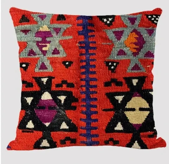 Bohemian linen cushion cover in red-dominant multicolor abstract geometric print