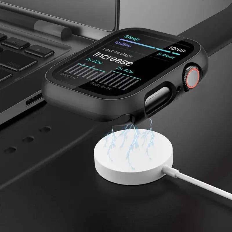 Tempered-glass screen protector and black protective case for Apple Watch (38–46mm) with wireless charging puck.